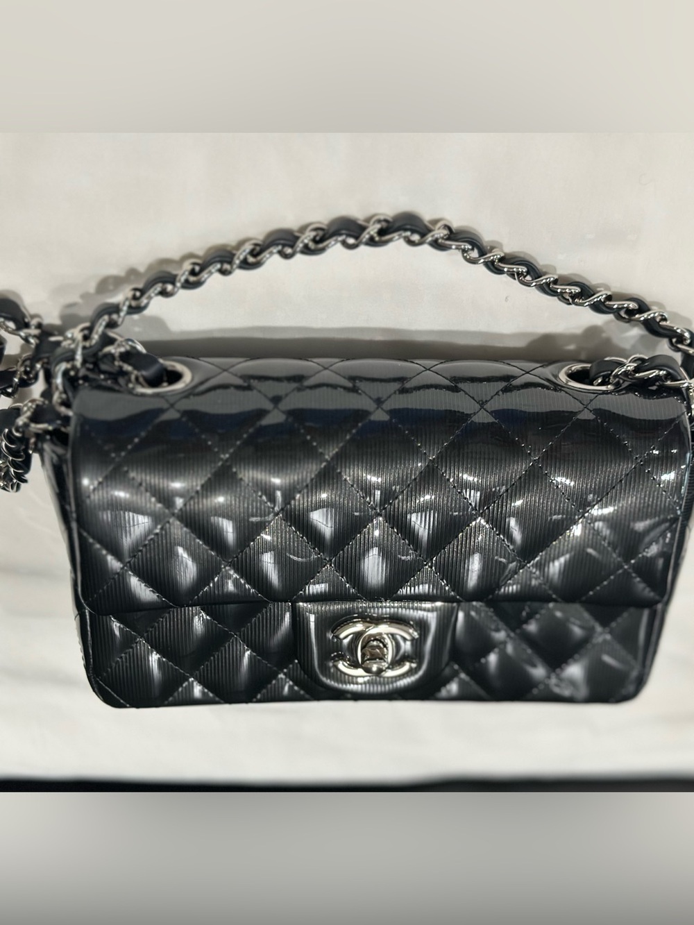 CHANEL Black Quilted Patent Leather Shoulder Bag with Silver Chain